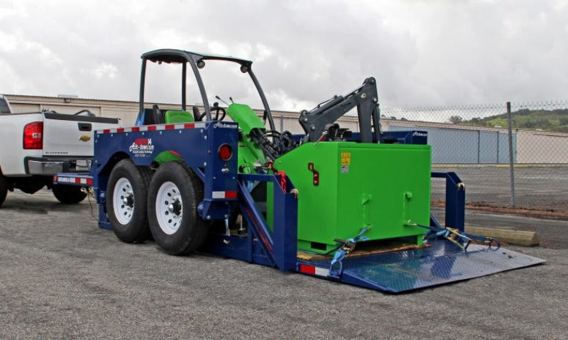Machine loaded at ground level strapped down to rear D-rings