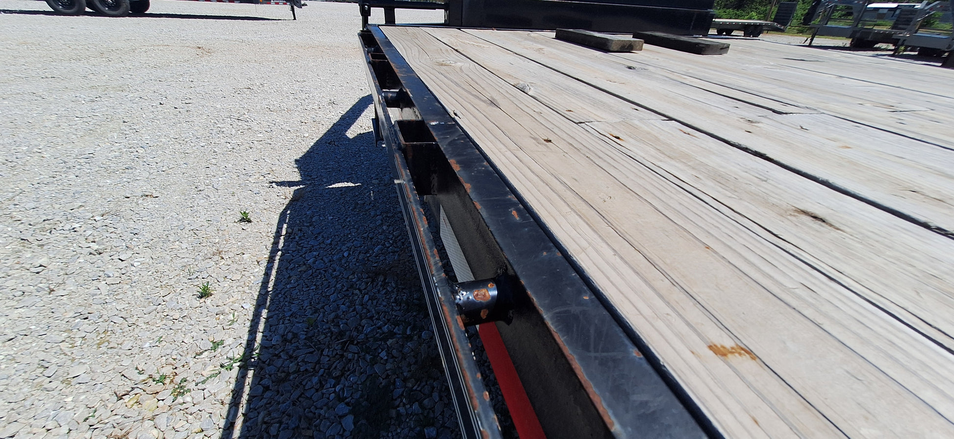Rub Rail with Stake Pockets run the length of both sides for continuous tie downs